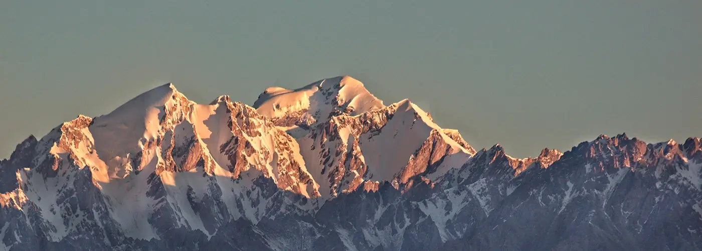 Snow-capped mountain range with a clear sky