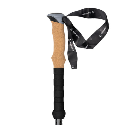 Kodiak trekking poles cork handle and black strap on a white background