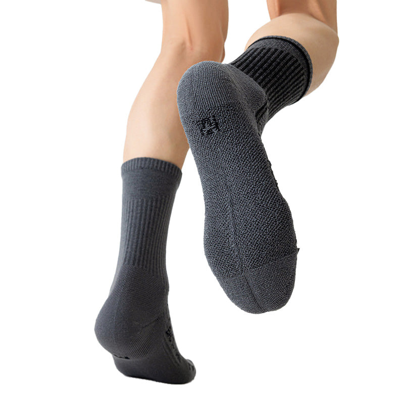 Bottom view of full-cushion Merino wool hiking socks showing the padded sole and reinforced heel and toe.