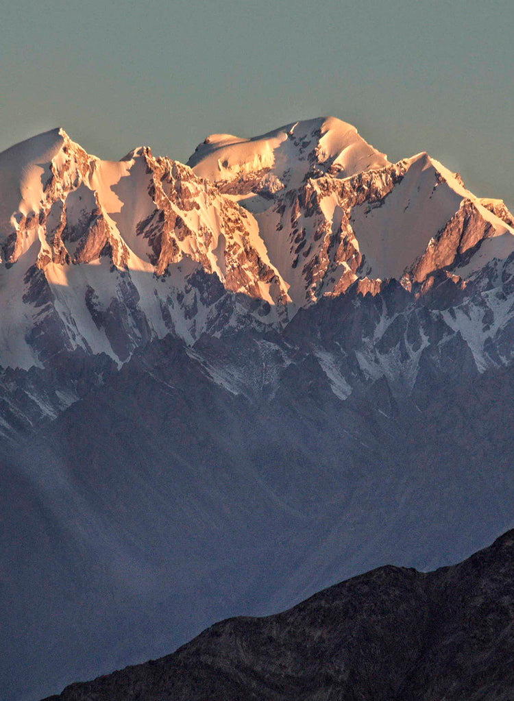 Snow-capped mountain range with a clear sky